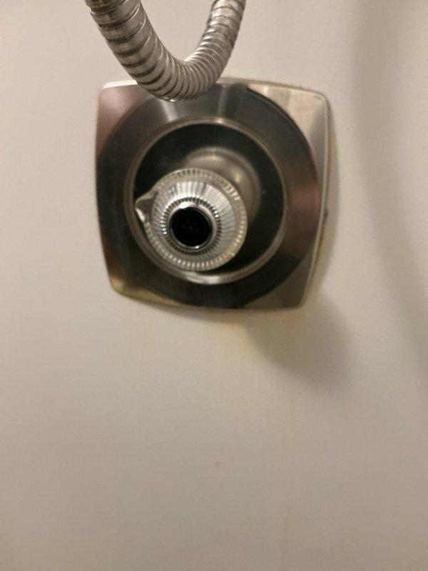Responded to service call for leaking shower head. Upon inspection, disassembled chrome shower fixture and replaced worn internal washer causing the leak. Tested water flow and verified no further dripping from shower head assembly. System restored to proper working condition.