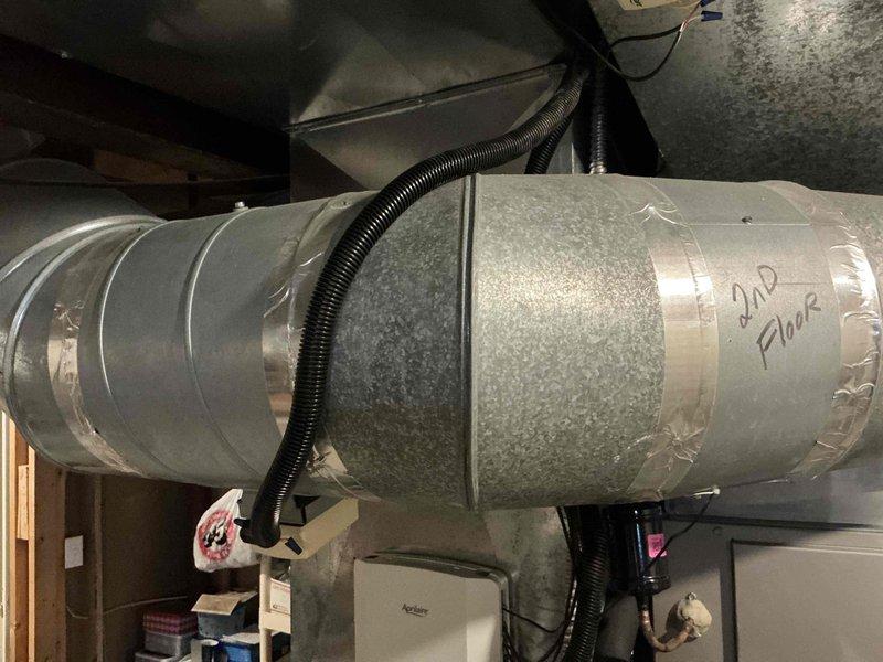 Conducted comprehensive estimate for complete HVAC system replacement in residential basement installation. Evaluated existing furnace/air handler unit, Aprilaire humidification system, condensate drainage configuration with PVC piping, and multi-zone ductwork serving second floor, documenting current equipment condition and installation specifications to provide replacement options for customer consideration.