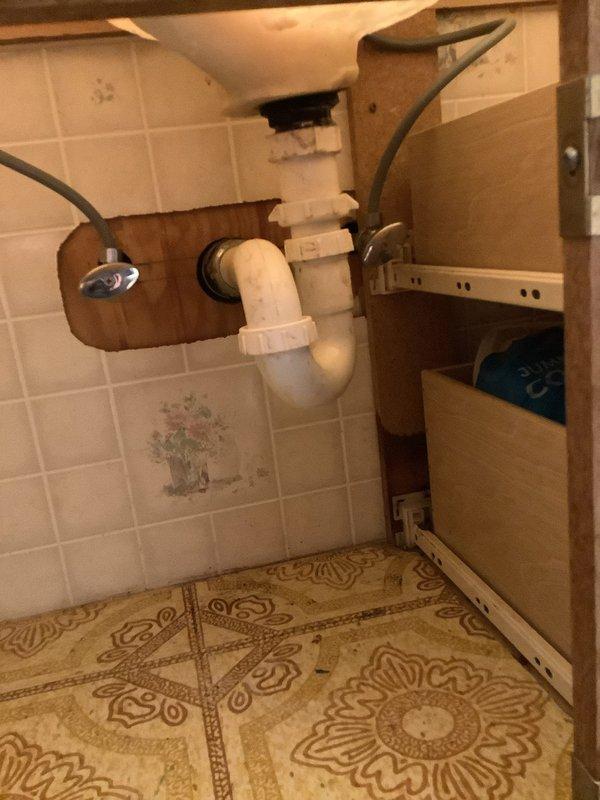 Responded to clogged bathroom sink drain call. Upon arrival, accessed plumbing beneath vanity cabinet and inspected P-trap assembly and drainage system. Removed obstruction from drain line, cleared blockage, and verified proper water flow through sink drain and P-trap. Tested drainage system to ensure complete restoration of function and confirmed no leaks at pipe connections before completing service.