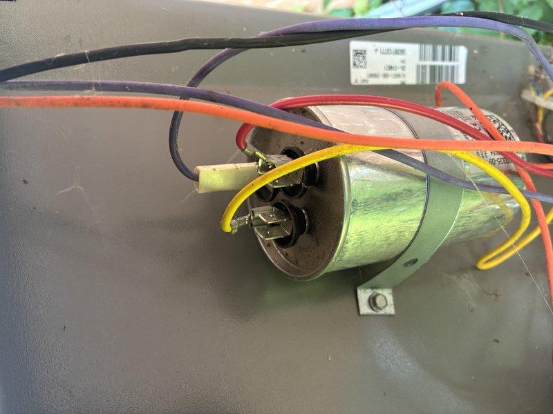 Replaced failed capacitor and installed hard start assist kit to resolve HVAC system startup issues. Unit tested and confirmed operational with proper temperature readings, all components functioning within normal parameters using truck stock parts.