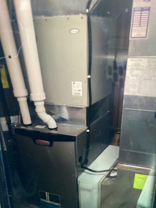 Responded to service call for non-operational air conditioning unit. Upon inspection, discovered heavily corroded dual-run capacitor with significant rust and oxidation on terminals and blade connections. The capacitor exhibited advanced deterioration due to moisture exposure, compromising electrical connections and preventing proper system operation. Replaced failed capacitor with new unit rated at 440VAC, ensuring all wire connections were secure and properly seated on terminals. Verified system startup and confirmed air handler operation with normal amperage draw. Unit returned to full cooling capacity.