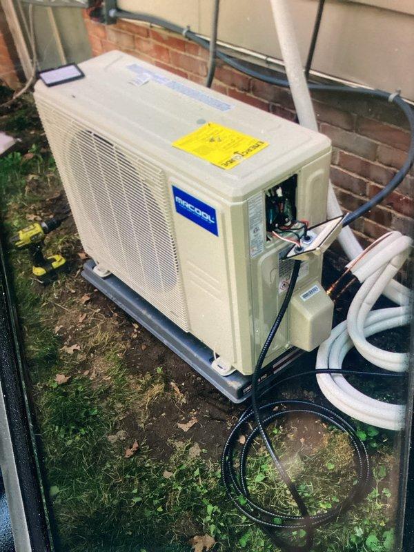Responded to service call for newly installed central air conditioning system that failed to start. Upon arrival, inspected outdoor condenser unit and electrical connections. Found improper wiring at terminal block inside condensing unit's electrical panel. Corrected wire connections per manufacturer specifications, ensuring proper voltage supply to compressor and fan motor. Verified all terminal connections were secure and properly seated. Tested unit operation and confirmed system startup, with compressor and condenser fan running normally. System now operating as designed.