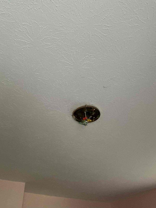 Responded to electrical hazard involving ceiling fan producing arcing and hissing sounds that required shutting off power to entire circuit. Upon arrival, inspected the affected fixture and surrounding electrical components, documented conditions with photographs, and safely resolved the dangerous arcing condition to restore normal operation and eliminate the fire hazard.