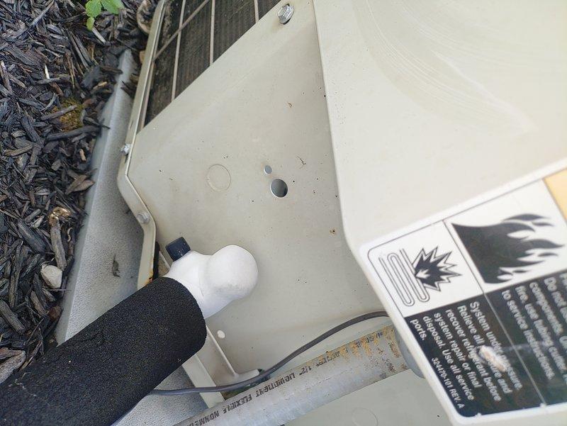 Responded to service call for non-functional air conditioning system with indoor temperature reaching 85°F. Upon inspection, discovered extensive frost and ice buildup on refrigerant lines in the air handler compartment, indicating a restriction in refrigerant flow or low refrigerant charge. Examined outdoor condensing unit and identified potential airflow or refrigerant-related issues requiring further diagnosis and repair to restore proper cooling operation.