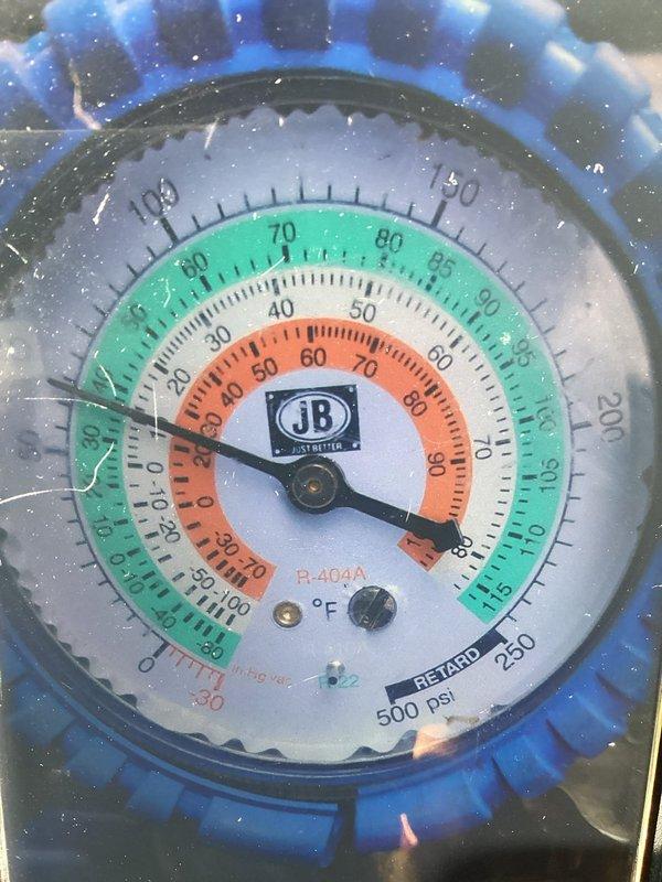 Responded to AC unit with frozen evaporator coil condition. Upon arrival, system was heavily frosted and unable to be serviced immediately. Advised homeowner to power off unit and allow complete defrost before diagnostic work could proceed. Returned for follow-up appointment to assess system pressures using refrigerant gauges for R-404A, confirming refrigerant levels and identifying root cause of freezing condition.