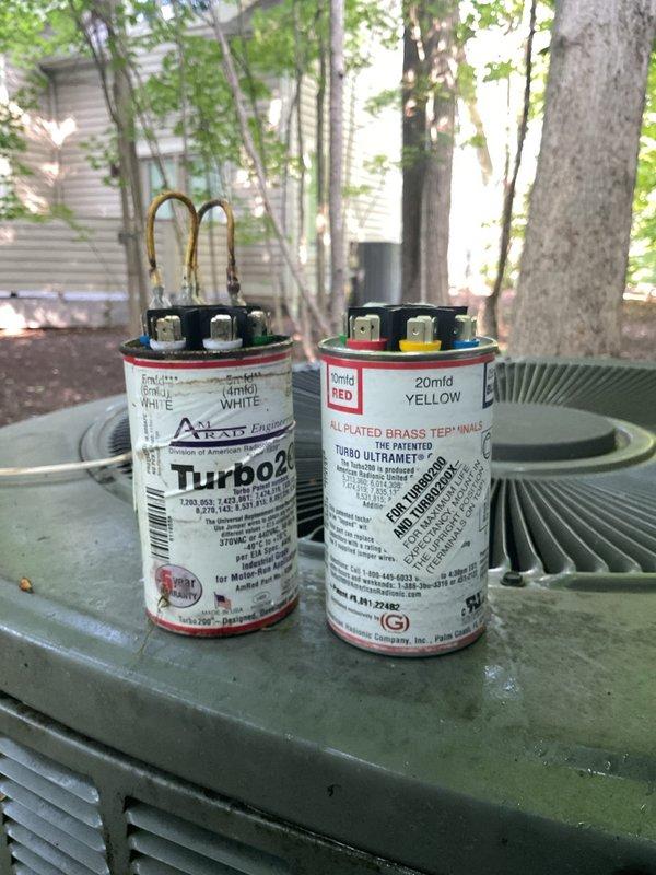 Completed scheduled maintenance on 15-year-old air conditioning system. Upon inspection, discovered animal nesting material in electrical compartment of outdoor condensing unit, which posed fire hazard and potential electrical failure risk. Removed all nesting debris and inspected electrical components for damage. Evaluated dual-rated capacitors (10mfd and 20mfd) with gold-plated brass terminals, confirmed proper operation and secure wire connections. Cleaned condenser coil fins and exterior surfaces of unit. Verified all electrical connections, tested system operation, and confirmed unit is functioning within normal parameters. Recommended customer consider installing pest guard to prevent future animal intrusion.