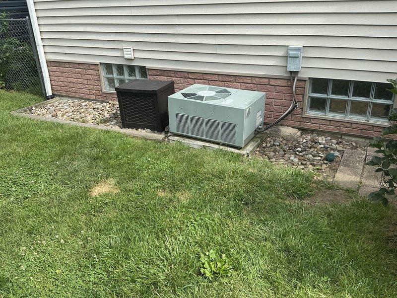 Completed comprehensive estimate for full residential HVAC system replacement at property with 25-year-old existing equipment. Inspected current Ruud furnace installation in basement mechanical room and exterior condensing units positioned on gravel pad against foundation. System currently operational with no reported issues; replacement quote requested proactively due to age of equipment. Documented existing equipment configuration, ductwork connections, electrical service, and outdoor unit placement. Verified available promotional offers for combined furnace and air conditioning replacement package. Provided detailed replacement options and pricing for complete system upgrade.
