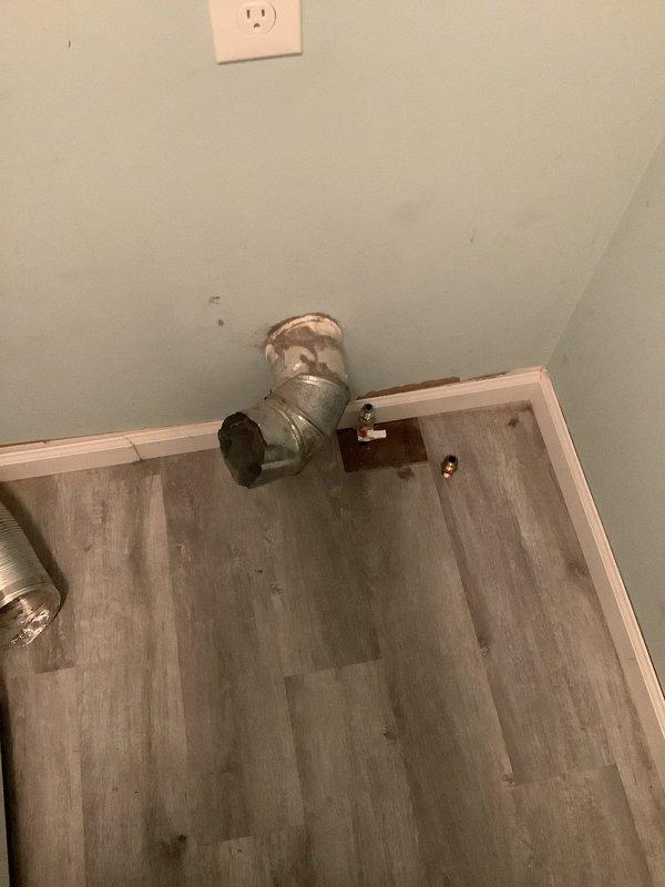 Installed gas line fitting and valve assembly for dryer connection. Ran flexible gas line from wall-mounted shut-off valve with proper fittings and secured all connections to code. System tested and verified operational for safe appliance use.