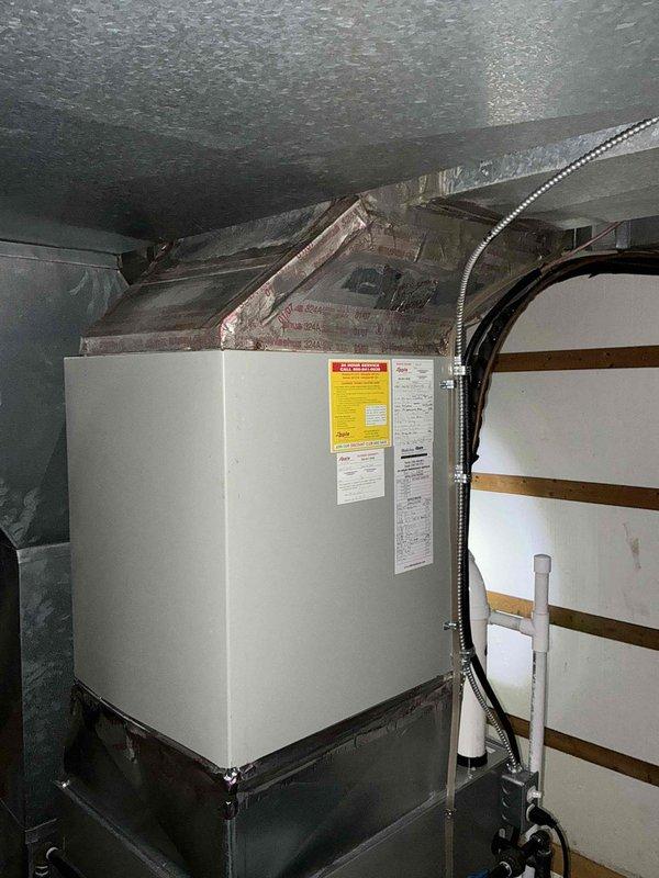 Completed comprehensive HVAC system replacement estimate for furnace and air conditioning equipment. Assessment included evaluation of existing attic-mounted air handler unit with associated ductwork and insulation, as well as outdoor condensing unit with electrical disconnect and conduit connections. Provided detailed replacement recommendations and specifications for complete system upgrade.
