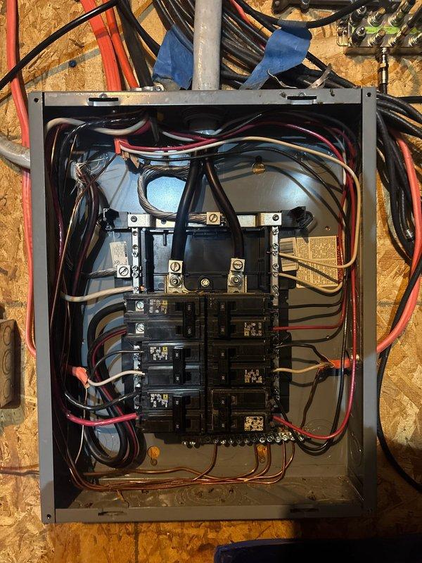 Completed electrical installation for 28 kW standby generator system with 20' electrical service line run from main panel to generator location. Installed load center with circuit breakers and proper wire routing, established metered service connection at outdoor utility pole with weatherproof enclosures, and performed LP gas stub-out preparation for future propane connection. System is ready for final walk-through inspection pending propane tank installation and gas line connection by propane company.