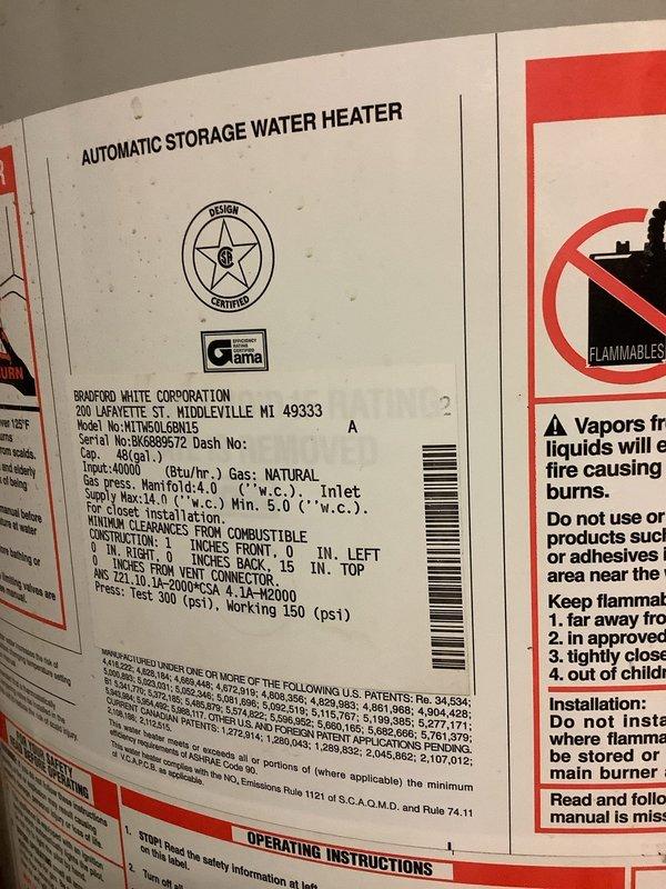 Responded to emergency call for gas water heater failure with active leaking that began over the weekend. Upon arrival, confirmed existing 48-gallon Bradford White natural gas water heater had sustained major leak, with water and gas supply already shut off by customer. Conducted assessment of failed unit and surrounding plumbing infrastructure, including copper supply lines and PVC drain-waste-vent system. Documented existing installation specifications showing 40,000 BTU/hr input rating unit. Provided estimate for complete water heater replacement with same-day installation capability to restore hot water service.