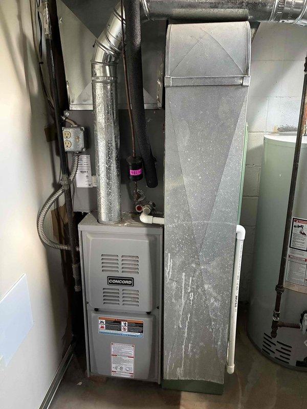 Completed comprehensive AC tune-up on Concord furnace system with outdoor condensing unit. Inspected electrical components, capacitor, contactors, and wiring connections; all found secure and functioning properly. Noted low airflow concerns in certain rooms and dust accumulation on ductwork and plenum requiring attention.