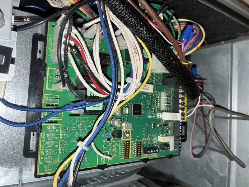 Responded to no cooling complaint where system was not maintaining desired temperature. Inspected control board and electrical connections within air handler—all wiring, terminals, and electronic components found secure with no signs of damage or failure. Checked evaporator coil assembly and noted filter had accumulated dust and debris affecting airflow. System evaluated and operational parameters verified.