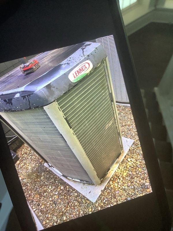 Responded to no cool call on Lennox rooftop unit that was not operating. Upon arrival, performed diagnostic check on system and documented equipment condition including outdoor condensing unit and ductwork components. Verified unit status and captured photographic documentation of installation for service records.
