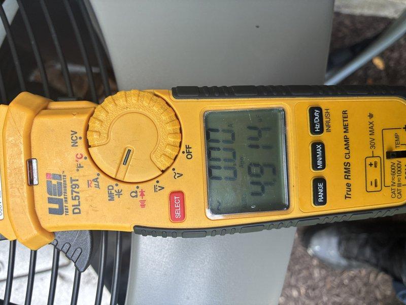 Completed MVP cooling maintenance visit on 5-year-old system. Performed electrical diagnostics using clamp meter, recording amperage draw of 260.3 amps on unit components. Inspected and removed fuse block assembly containing four copper fuses for visual examination, confirming proper electrical protection components were in place and functional.