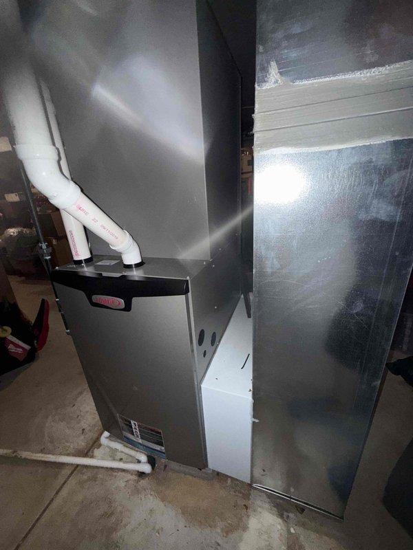 Completed preventive maintenance visit on 9-year-old Lennox HVAC system. Performed comprehensive cooling system inspection, including examination of furnace unit, air handler cabinet, control board, and all electrical connections. Verified proper operation of all components, checked ductwork connections, and confirmed system functionality for optimal cooling performance.