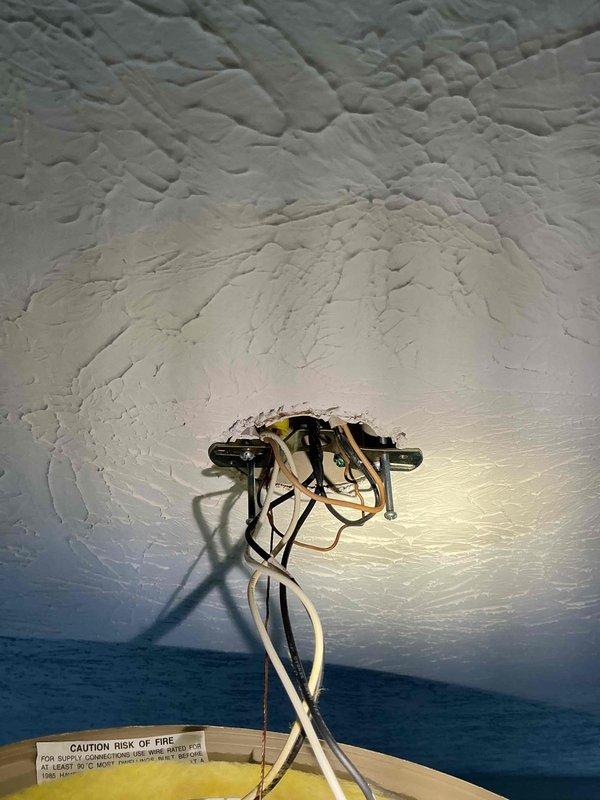 Provided quote for installation of customer-supplied ceiling fans and assessed electrical junction boxes with exposed wiring visible at ceiling locations. Corrected and secured loose casing from previous installation work to ensure proper finishing and safety compliance.