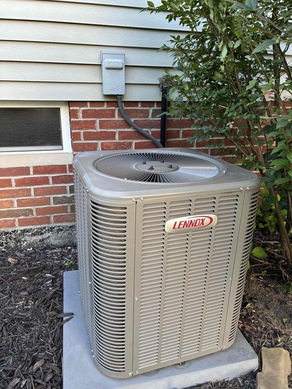 Completed MVP cooling maintenance visit on 9-year-old Lennox residential air conditioning system. Performed comprehensive inspection of outdoor condenser unit, noting significant accumulation of dirt, dust, and debris throughout condenser coil fins. Cleaned condenser coils to restore proper airflow and heat transfer efficiency. Verified electrical connections at disconnect box, inspected refrigerant lines, and confirmed unit operational status. System returned to normal service with improved cooling performance.