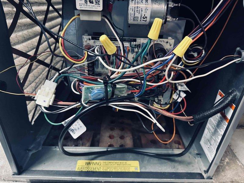Completed annual MVP cooling maintenance visit on 1-year-old system. Performed comprehensive inspection of air handler unit, verifying all electrical connections, capacitor operation, and control board functionality. All wiring connections secure with proper wire nuts in place. Reviewed manufacturer's air conditioner charging information chart and confirmed system operating parameters are within normal specifications for current conditions. Unit operating properly with no issues found.