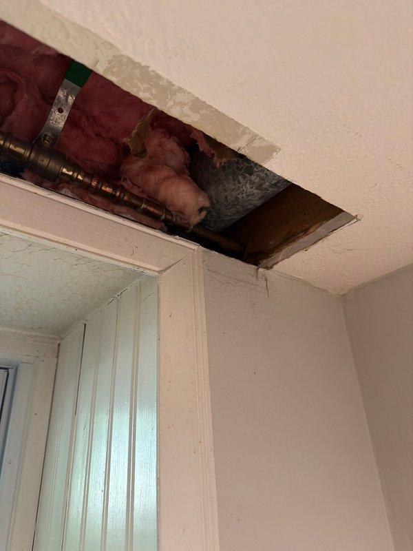 Responded to complaint of outdoor spigot continuously dripping after shut-off at 30-year-old residence. Accessed ceiling cavity to inspect supply lines and shutoff valve serving exterior hose bib. Identified worn internal valve components requiring replacement. Documented existing copper piping configuration and fittings with photographic evidence. Ordered necessary repair parts for shop delivery and scheduled follow-up appointment to complete valve rebuild and restore proper shutoff function.