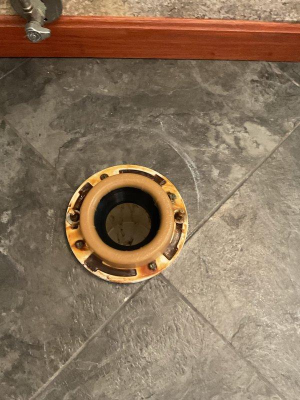 Removed and hauled away existing toilet from bathroom. Installed new customer-supplied toilet onto existing brass toilet flange, ensuring proper seal and secure mounting. Verified functionality and left work area clean with all fixtures operational.