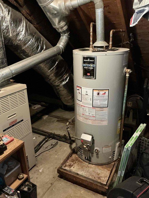Conducted on-site evaluation for central air conditioning system installation in a late 1950s residential property with no existing cooling system. Previous AC unit from approximately 1970s had been removed, requiring assessment of existing ductwork infrastructure, electrical capacity, and optimal equipment placement. Inspected basement mechanical room containing Lennox furnace and existing ductwork system to determine compatibility with new AC installation. Photographed current HVAC setup including furnace unit, metallic supply ductwork with reflective insulation, and available space for new equipment connections. Evaluated electrical service capacity and confirmed furnace compatibility for AC coil integration. Provided comprehensive replacement estimate for complete central air conditioning system installation including outdoor condensing unit, indoor evaporator coil, refrigerant lines, condensate drainage, thermostat upgrade, and necessary electrical connections to restore cooling c