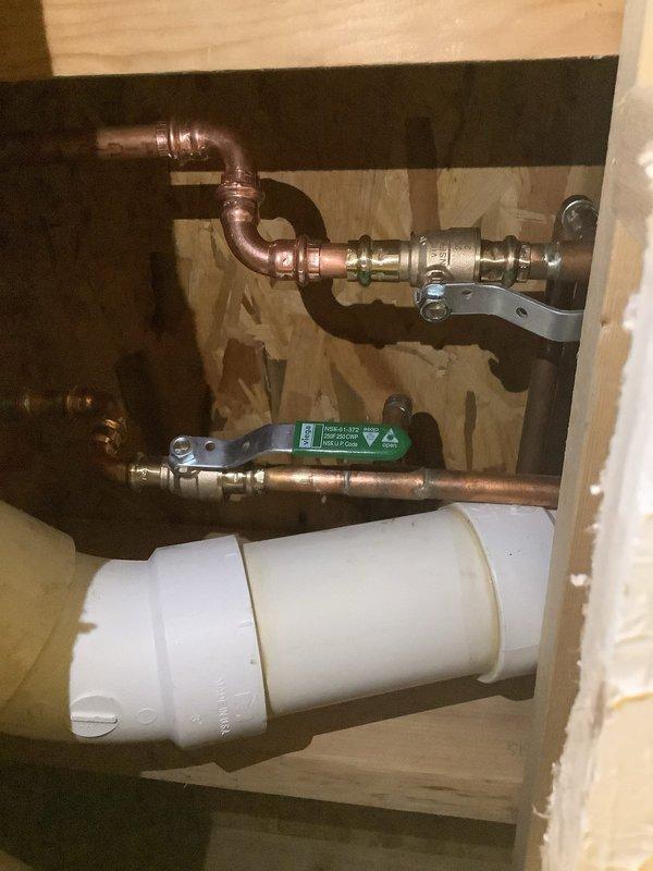 Completed installation of Navien NPE-240 tankless water heater with wall mounting, including expansion tank and isolation valves for proper system protection and serviceability. Installed fresh air intake and exhaust venting to exterior per manufacturer specifications. Reworked existing gas line to accommodate new unit requirements and ensure proper fuel delivery. Replaced three existing hose bibs throughout the residence with new frost-free sillcocks to prevent freeze damage and improve exterior water access. All copper piping connections completed with proper support brackets and fittings. System tested and verified operational with all safety controls functioning correctly.