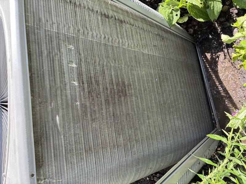 Responded to no cooling complaint on 5-year-old air conditioning system. Upon inspection, found blower wheel heavily coated with dust and debris, restricting airflow, and condenser coil significantly obstructed with dirt and grime accumulation. Cleaned blower assembly and condenser coil, restoring proper airflow and heat transfer capability. System tested and verified cooling operation restored to manufacturer specifications.