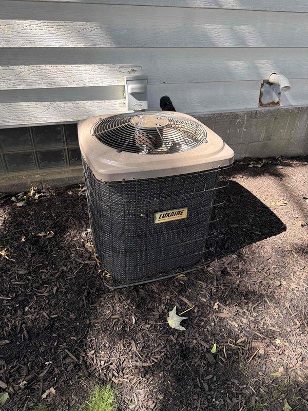 Responded to service call for inadequate cooling with unit unable to maintain setpoint temperature. Upon arrival, inspected Luxaire outdoor condensing unit and found system operational but underperforming. Noted deteriorated pipe insulation on refrigerant lines requiring attention for optimal efficiency and protection of line set from environmental exposure.