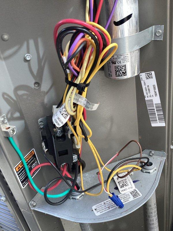 Responded to service call for whole-house air conditioning system displaying "Line 1 Fuse Bad When Lit" error code with illuminated fuse indicator light. Upon arrival, inspected the disconnect switch assembly and confirmed Line 1 fuse fault indicator was active. Performed diagnostic testing of the electrical circuit, identified failed fuse in Line 1 position, and replaced faulty fuse with proper amperage-rated replacement. Verified proper electrical continuity, reset system, and confirmed fault indicator light extinguished and unit returned to normal operation with no additional error codes present.