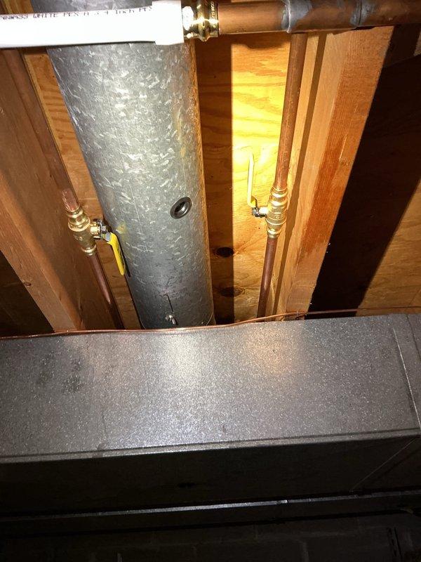 Relocated two inconveniently positioned basement shut-off valves to accessible locations and installed new ball valves for improved operation. Replaced two aging, leaking exterior hose bibs in the garage with new frost-free faucets, including complete copper supply line replacement with new pipes and fittings from the relocated shut-off valves to the exterior wall penetrations.
