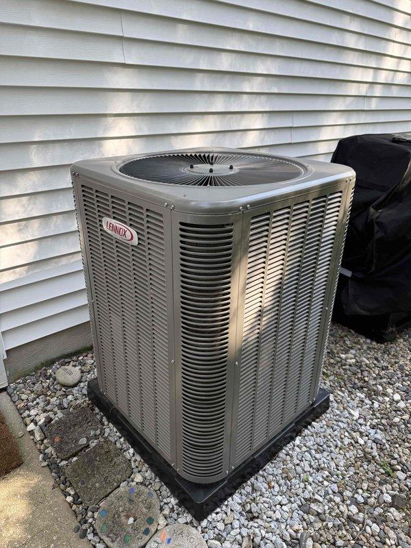 Performed routine preventive maintenance on Lennox air conditioning system less than one year old. Inspected outdoor condenser unit and indoor furnace, verified proper operation of all components, checked refrigerant levels, cleaned coils as needed, and confirmed system functionality with no issues found.