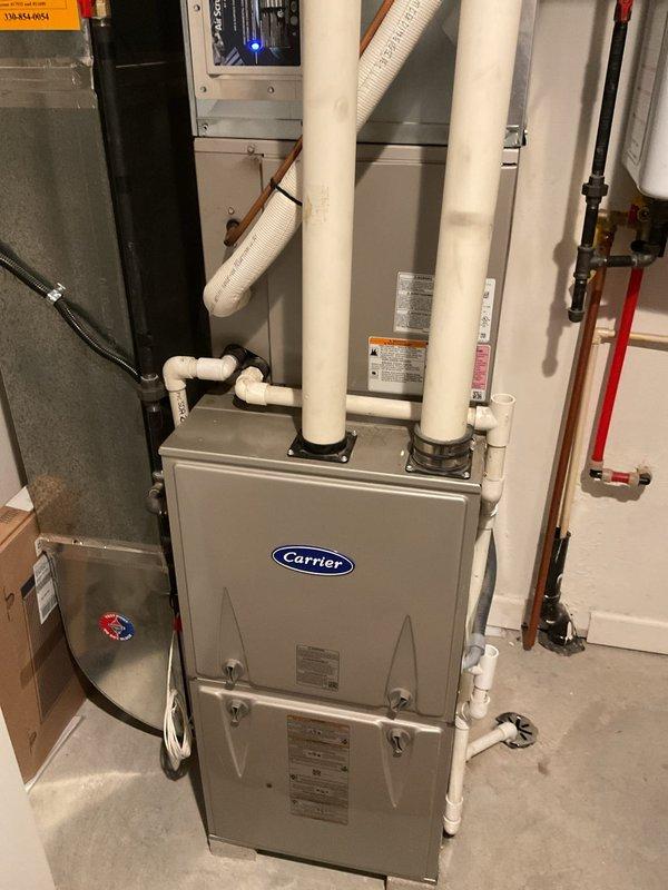 Responded to cooling failure complaint on three-year-old Carrier HVAC system with indoor temperature significantly exceeding setpoint. Performed diagnostic evaluation of outdoor condenser unit and indoor air handler, inspecting electrical connections, refrigerant lines, and system components. System assessed and documented for proper operation and cooling performance restoration.