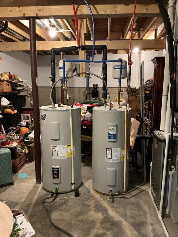 Responded to service call for leaking 6-year-old residential water heater requiring replacement. Upon inspection, confirmed active leak from existing tank unit necessitating immediate replacement to prevent water damage. Installed new Bradford White 50-gallon electric water heater (Model RE350S6-1NCWH) with dual heating elements rated at 4500W/3500W operating at 240V/208V single-phase. Connected all supply and discharge piping with proper shut-off valves, installed temperature and pressure relief valve, and verified all electrical connections to junction box. Tested unit for proper operation, confirmed no leaks at connections, and ensured system met manufacturer specifications and local code requirements.