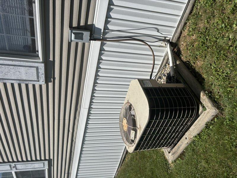 Performed routine maintenance and inspection on residential split-system air conditioning unit. Inspected indoor air handler located in utility closet, verifying proper operation of electrical components, control board, and blower assembly. Examined outdoor condensing unit, confirmed fan operation, checked refrigerant line connections, and verified unit was properly secured on concrete pad. System operating within normal parameters with no deficiencies noted at time of service.