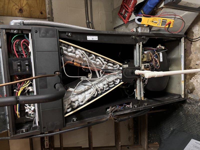 Responded to emergency no-cool call and performed diagnostic evaluation of residential air conditioning system. Upon inspection, accessed evaporator coil assembly and electrical control components to identify system failure. Utilized digital multimeter to test electrical connections, control board functionality, and circuit integrity at the air handler unit. Troubleshot wiring connections at terminal blocks and verified proper voltage supply from electrical panel to HVAC equipment.