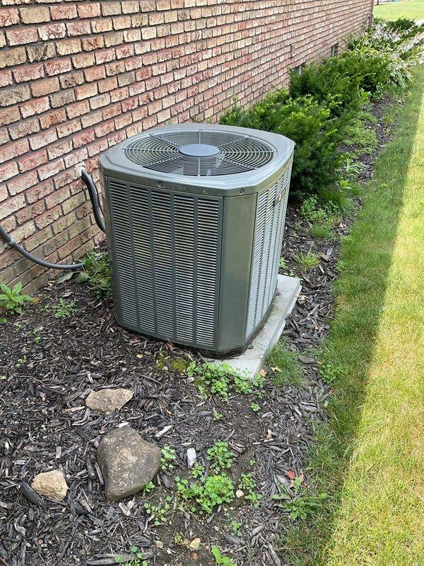 # HVAC Service Call: No Cool - 12-Year-Old System

Responded to a no-cooling complaint on a 12-year-old residential air conditioning system. Customer reported the outdoor condenser fan was not operating. Upon arrival, performed visual inspection of the outdoor unit and discovered significant ice buildup on the condenser coil, indicating a potential refrigerant restriction or airflow issue.

Diagnosed the condenser fan motor as failed, preventing proper heat rejection from the system. The non-operational fan caused the compressor to continue running without adequate cooling of the refrigerant, resulting in abnormal system pressures and the observed ice formation on the coil. 

Recommended condenser fan motor replacement to restore proper system operation. Given the age of the unit at 12 years and the condition observed, also advised customer that additional components may require attention in the near future due to normal wear and deterioration. Customer was informed of repair options a