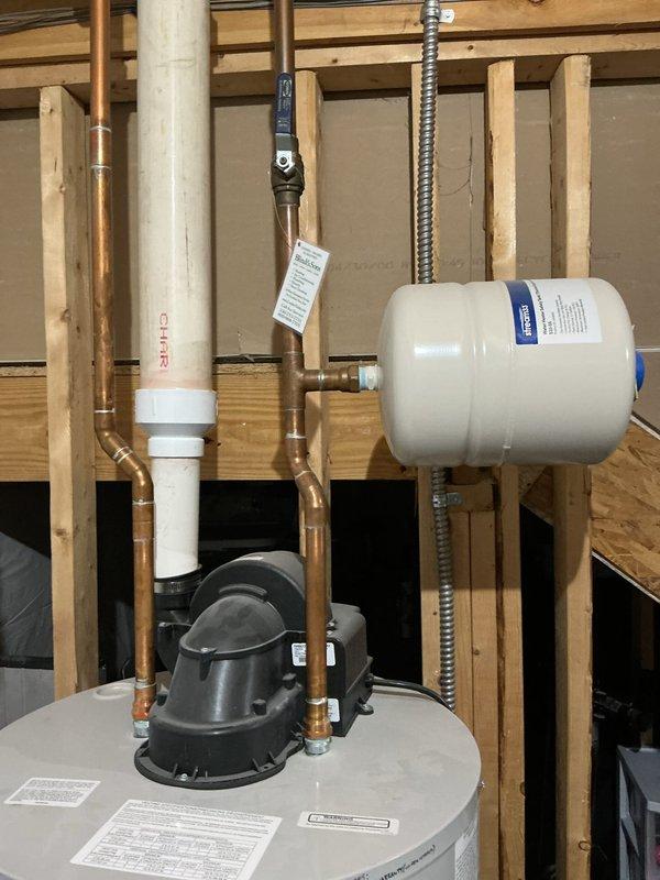 Performed routine maintenance flush on 5-year-old automatic storage water heater operating without issues. Drained sediment buildup from tank bottom, verified proper function of temperature and pressure relief valve, and inspected all copper supply lines and brass fittings for leaks. Conducted whole-home water pressure test at multiple fixtures to ensure system pressure within optimal range of 40-80 PSI. Confirmed expansion tank proper charge and verified all connections secure. Unit returned to normal operation with no deficiencies noted.