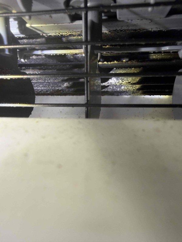 Completed MVP cooling maintenance on three mini-split systems. Upon inspection, discovered significant accumulation of dirt, dust, and debris on evaporator coils and heat exchanger fins, with brownish-black discoloration visible across multiple surfaces. Cleaned all interior components, removed debris from unit cavities and mounting brackets, and restored optimal airflow through coil surfaces. All three units tested and confirmed operating within normal parameters upon completion.