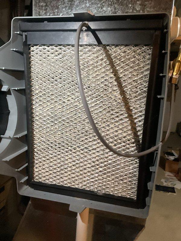 Completed MVP cooling maintenance visit at scheduled time. Performed comprehensive system inspection including refrigerant level verification using digital manifold gauges near condensate drain lines. Inspected and serviced humidifier pad assembly, confirming proper condition of evaporator media and frame integrity. All cooling system components operating within normal parameters with no deficiencies noted.