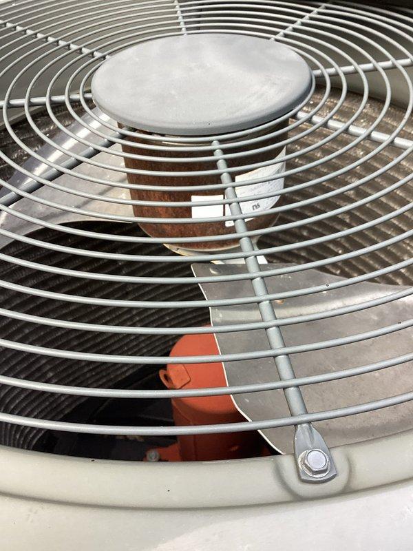 Completed preventive maintenance inspection on 3-4 year old air conditioning system. Performed comprehensive evaluation of outdoor condenser unit including fan motor assembly, protective grille, and internal components. Inspected indoor condensate pump system, verified proper operation and drainage function, and confirmed all electrical connections and mounting hardware were secure. All equipment found operating within normal parameters with no deficiencies noted.