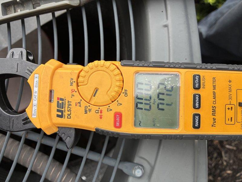 Performed routine air conditioning tune-up and preventative maintenance on residential cooling system. Conducted comprehensive system diagnostics including electrical measurements using clamp meter to verify proper amperage draw and voltage levels at outdoor condensing unit. All readings were within manufacturer specifications, and no issues or deficiencies were identified during inspection.