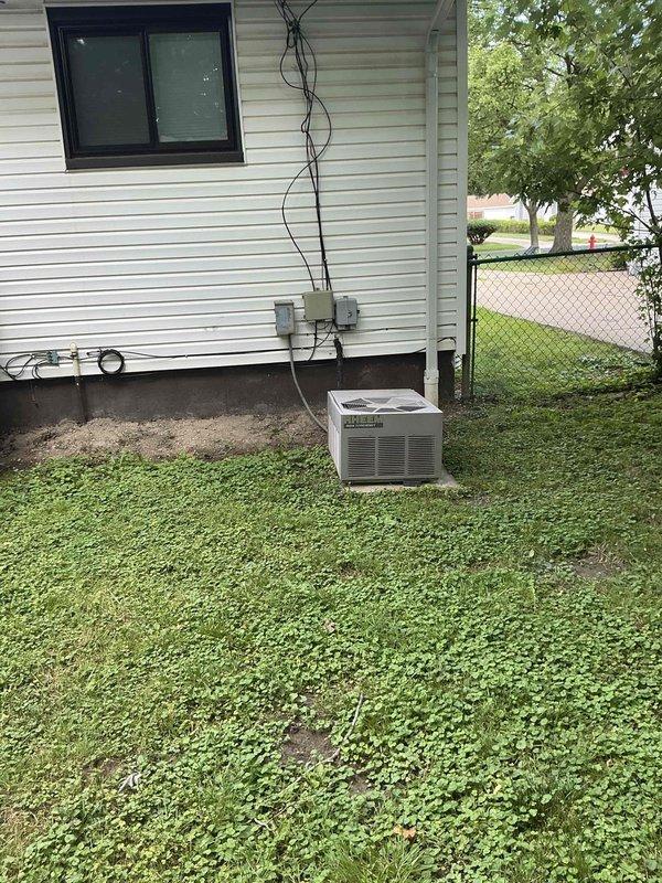 Conducted estimate for complete HVAC system replacement on 30-year-old unit utilizing R22 refrigerant. Assessed existing outdoor condenser unit and indoor AirTemp air handler with associated ductwork, noting age-related deterioration and obsolete refrigerant type requiring full system upgrade.