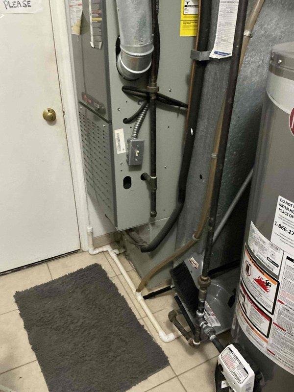 Conducted comprehensive HVAC system evaluation for 19-year-old R22 air conditioning system replacement estimate. Assessed existing mechanical room installation including air handler unit, ductwork configuration, and overall system condition, documenting equipment age and refrigerant type for replacement specifications. Provided detailed quote for complete system replacement due to obsolete R22 refrigerant and equipment age exceeding typical service life.