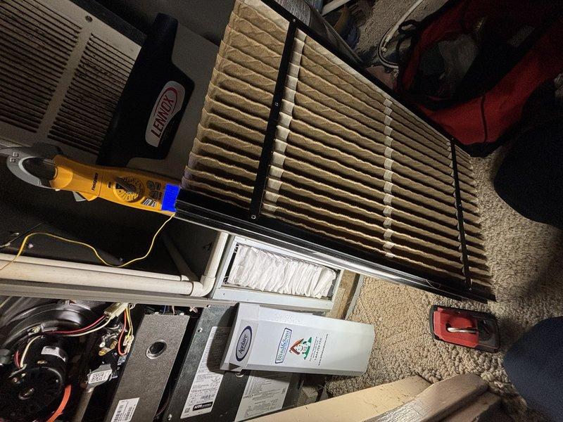 Completed MVP cooling maintenance visit on two HVAC units. Inspected indoor air handler and found heavily soiled accordion-style air filters with significant dust and dirt accumulation requiring replacement. Serviced outdoor condensing unit, which displayed weathered coils with brownish discoloration from environmental exposure. Performed standard maintenance procedures including filter replacement, coil inspection, and system evaluation to ensure proper operation of both units.