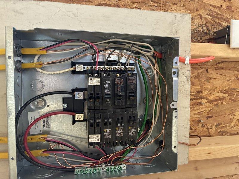 Installed two exterior GFCI-protected outlets with underground wiring runs. Excavated and trenched approximately 15 feet from the main residence and 10 feet from the detached shop building, routing direct burial cable through conduit to each new outlet location. Added dedicated circuit breakers to the electrical panel and completed all connections per NEC standards for outdoor receptacles.