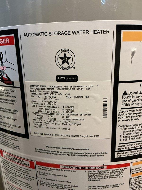 Replaced existing 59-gallon Bradford White power vent water heater with new 50-gallon Bradford White power vent unit (Model RG1PV50S6N1) featuring 6-year manufacturer warranty. Installation included replacement of expansion tank, upgrade from aluminum drain pan to lifted plastic pan with connection to existing PVC drain line, and integration with existing copper supply lines and PVC venting system. All components staged and installed per manufacturer specifications with proper clearances and code compliance.