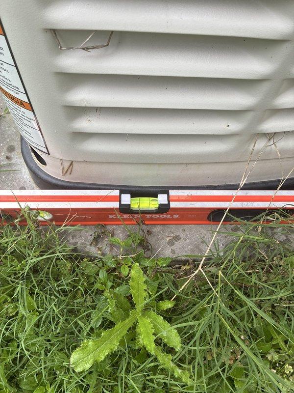 Responded to service call for unlevel generator installation. Upon arrival, confirmed generator unit was significantly out of level using precision measuring tools. Coordinated two-person crew and obtained two totes of gravel from warehouse as required materials. Successfully re-leveled generator unit to manufacturer specifications by adjusting base support with gravel fill material beneath concrete pad. Verified proper leveling with spirit level to ensure optimal equipment operation and longevity. Unit now meets installation standards for safe and efficient performance.