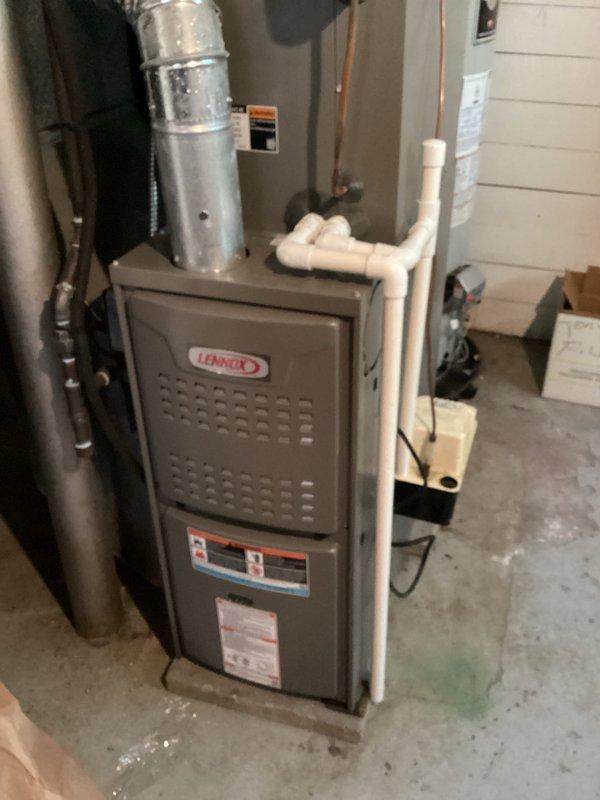 Completed MVP cooling maintenance visit on residential HVAC system. Performed comprehensive inspection of Lennox furnace unit and outdoor condensing unit, verifying proper operation of all components. Inspected electrical compartment of outdoor unit, checking capacitor connections, contactor functionality, and all wire terminations for security and proper voltage. Verified condensate drain lines are clear and functioning correctly. All system components operating within normal parameters with no deficiencies noted at time of service.