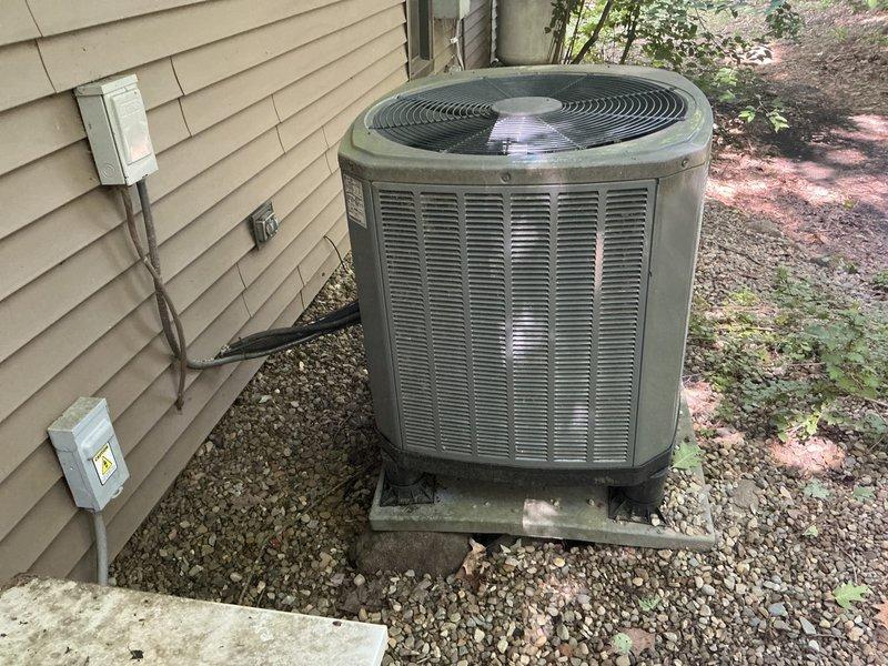 Completed comprehensive estimate for complete HVAC system replacement including heat pump and air handler. Assessed existing basement-installed equipment showing significant deterioration and corrosion on air handler cabinet surfaces. Evaluated outdoor condenser unit exhibiting weathering and age-related wear. Provided detailed quote for new system installation with specifications confirmed for proper sizing and equipment placement in non-attic basement location.